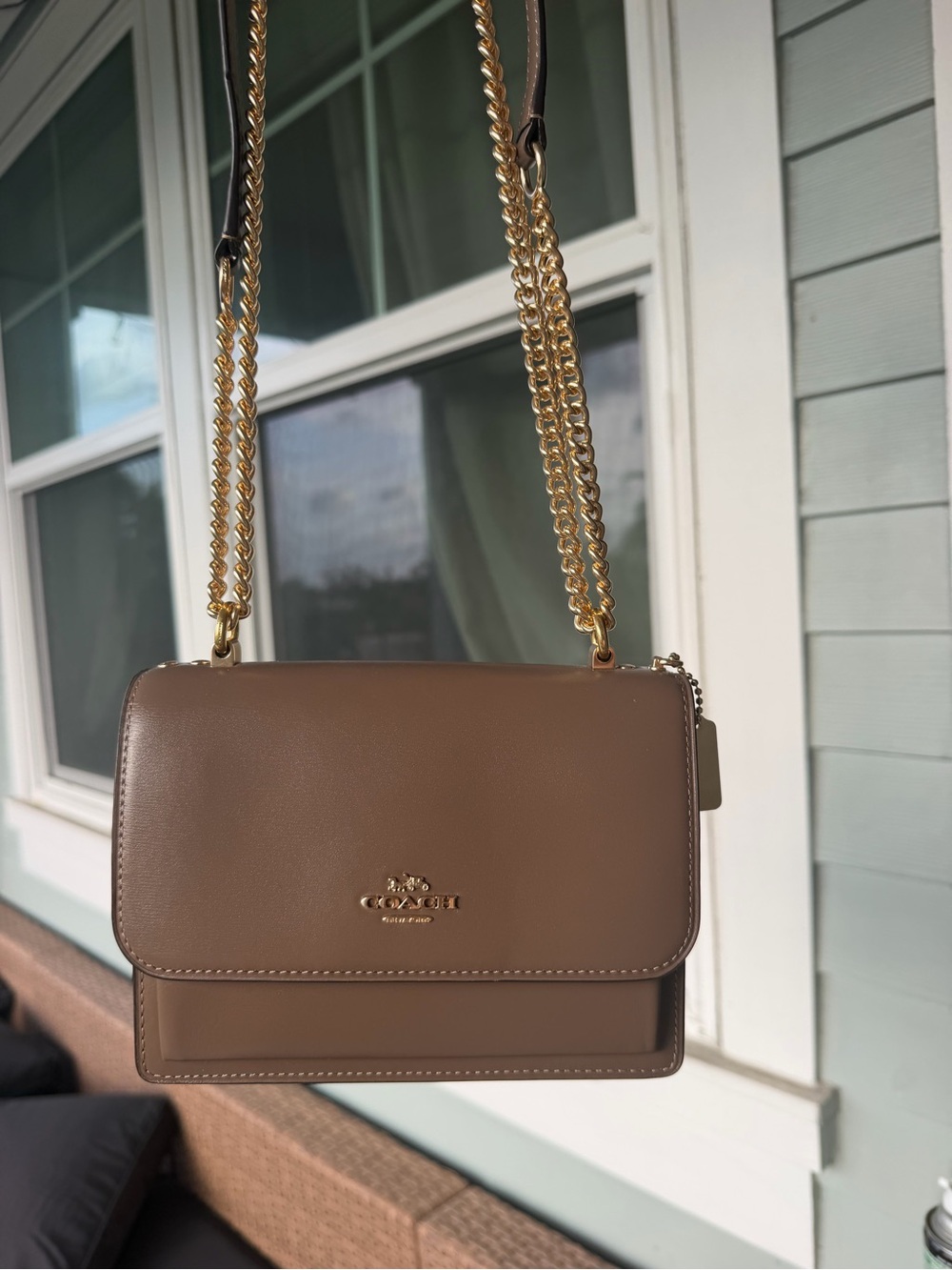 Coach mini klare in dark tone